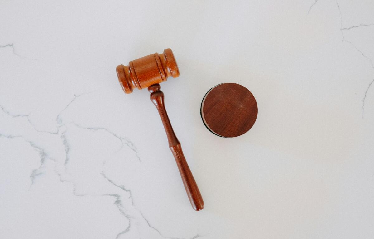 gavel on white marble