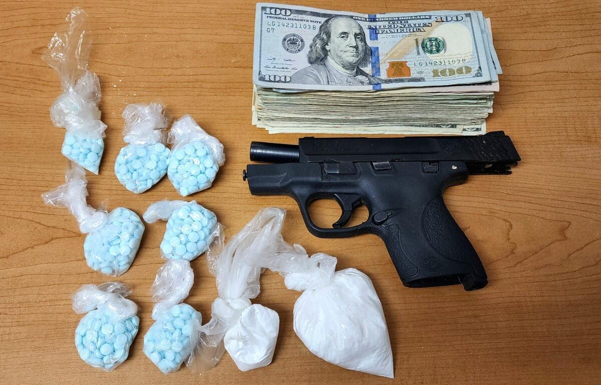seized drugs, gun, and money