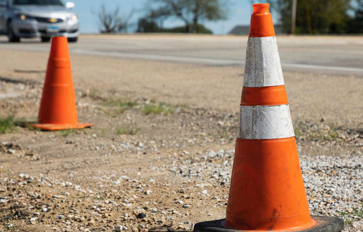 orange road work cones