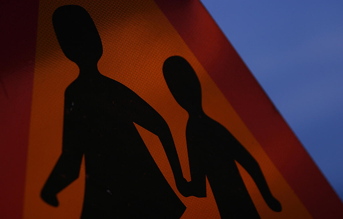 school zone walking sign