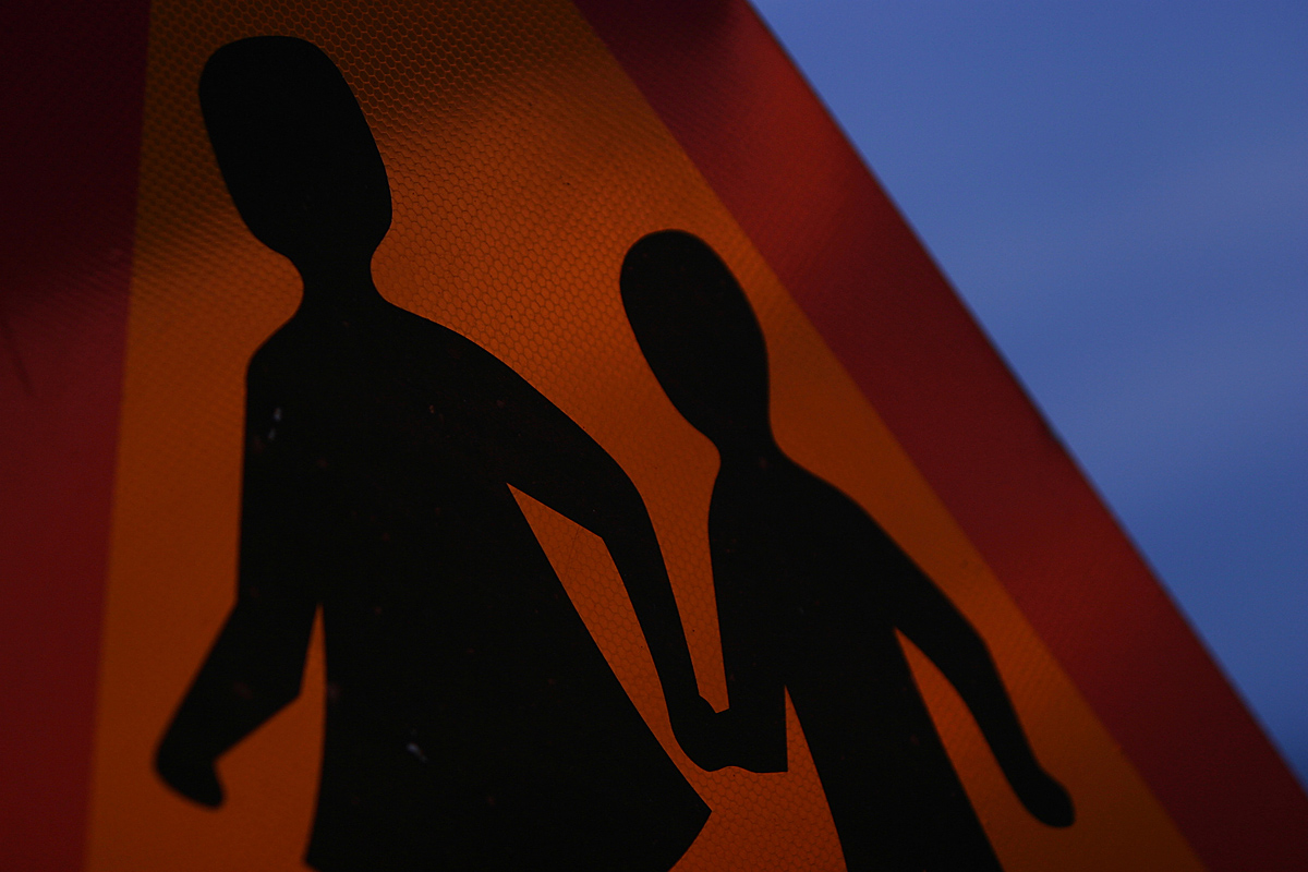 school zone walking sign