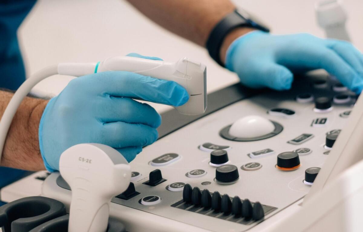 Person operating an ultrasound machine