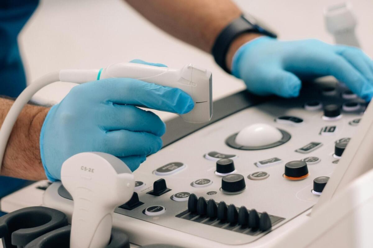 Person operating an ultrasound machine