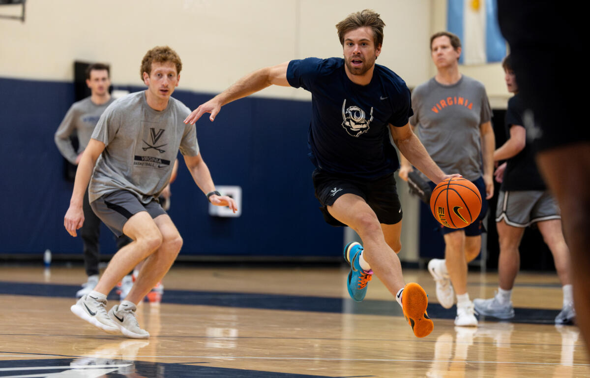 Dallin Hall dribbling at a Virginia Practice