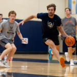 Dallin Hall dribbling at a Virginia Practice