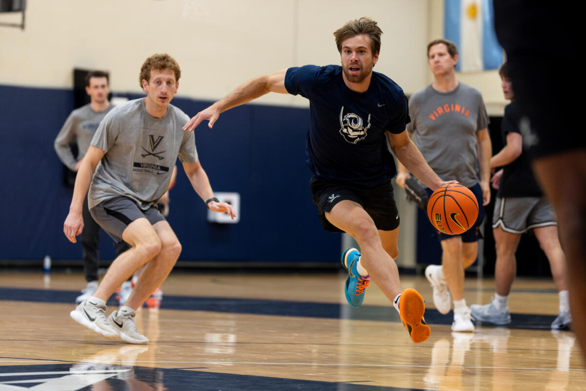 Dallin Hall dribbling at a Virginia Practice