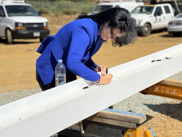 Del Callsen signs Mountain View Upper beam