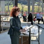 School Board Chair Kate Acuff addresses the ceremony