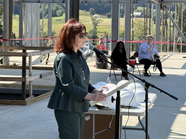 School Board Chair Kate Acuff addresses the ceremony