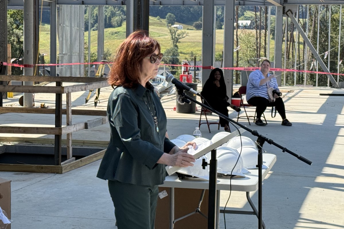 School Board Chair Kate Acuff addresses the ceremony