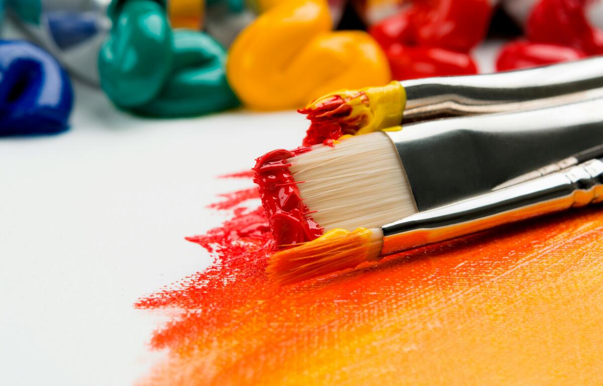 paintbrushes on canvas