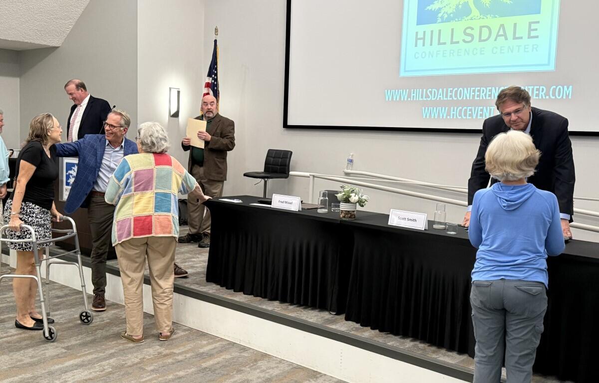 Fred Missel, left, Scott Smith, right