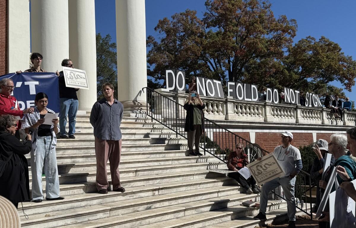 Sarah Ahmed speaks as Clay Dickerson looks on