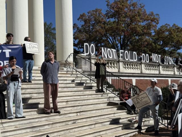 Sarah Ahmed speaks as Clay Dickerson looks on