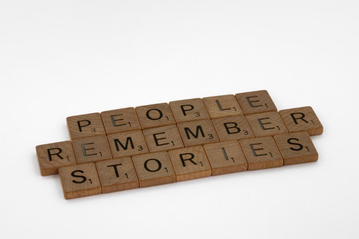 letter tiles spell out people remember stories
