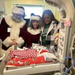 Santa visits a baby in the NICU