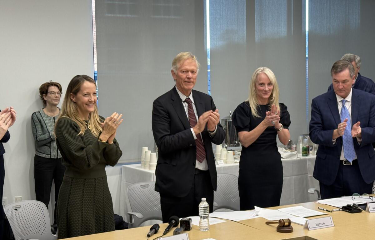 Porter Wilkinson. Scott Beardsley and Rachel Sheridan after naming Beardsley 10th UVA President