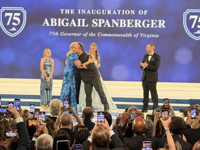 Spanberger and Dave Matthews hug