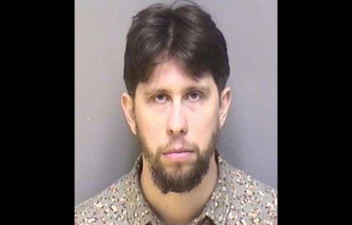 Formatted mugshot of Nick Clark, arrested Woodbrook Teacher