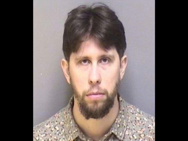 Formatted mugshot of Nick Clark, arrested Woodbrook Teacher