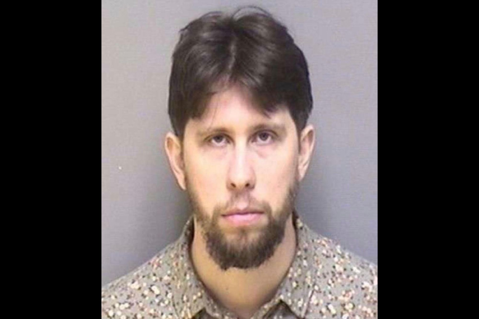 Formatted mugshot of Nick Clark, arrested Woodbrook Teacher