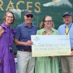 Foxfield presents a check to Camp Holiday Trails