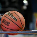 march madness basketball sitting on a rack