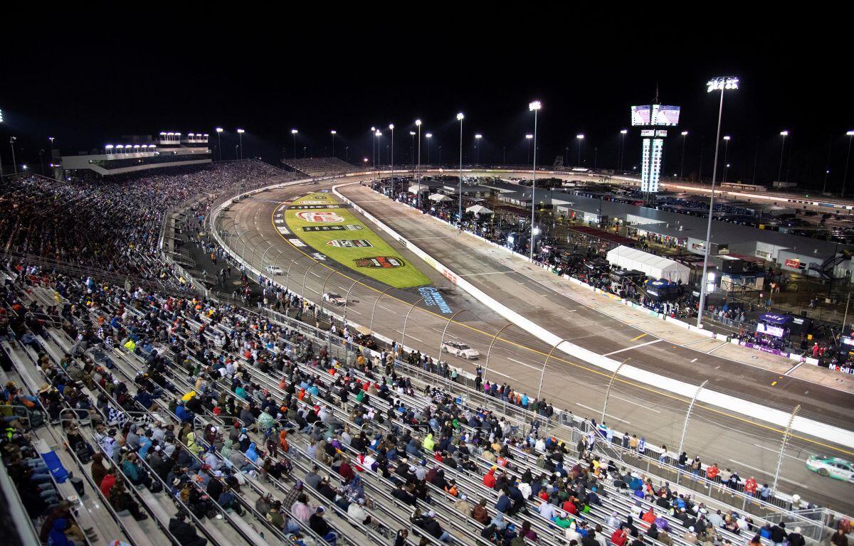 fans in stands overlooking Richmond Raceway