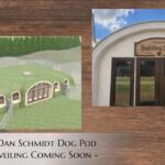 Concept render of a grass-roof dog pod with arched entrances beside a curved building entrance labeled 'Building Name'.