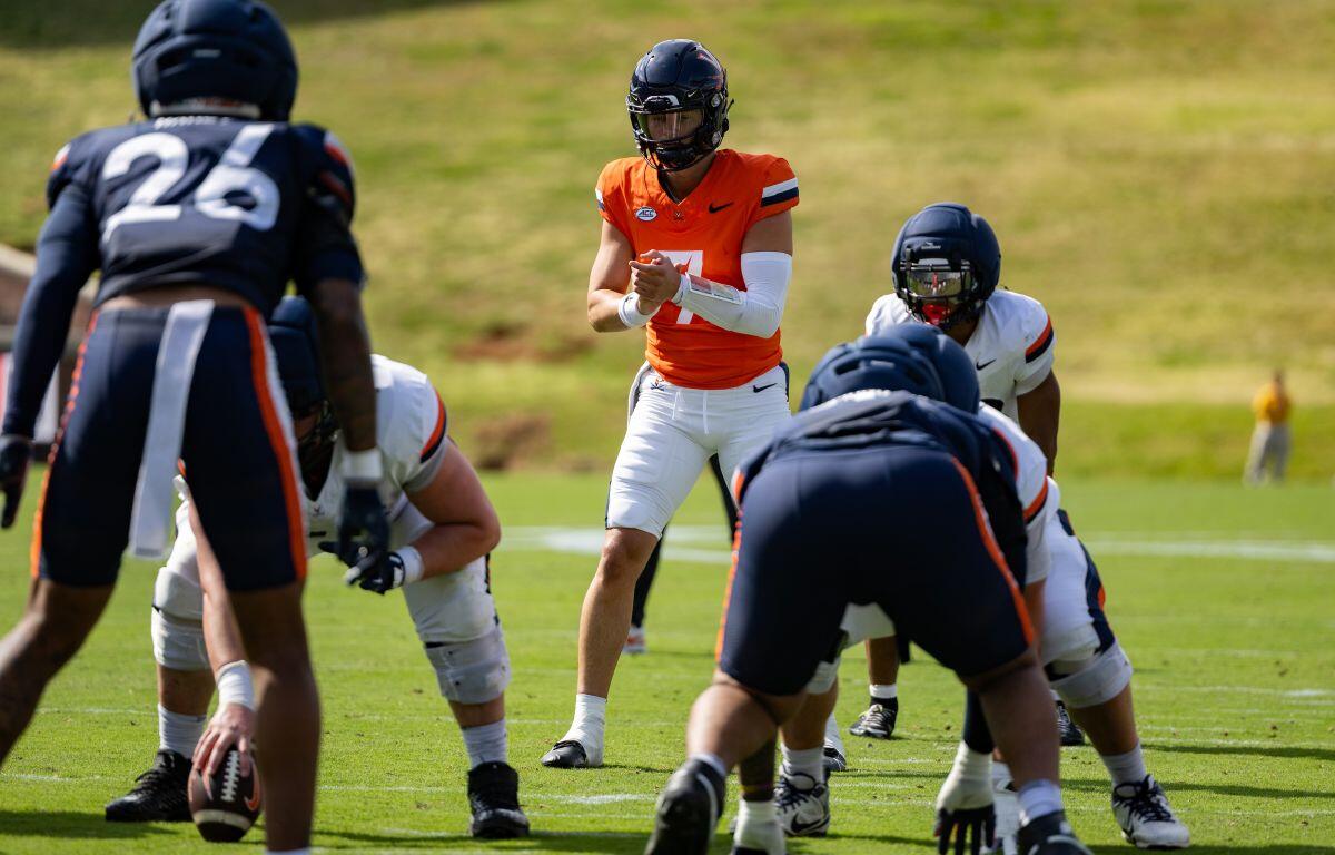 QB Beau Pribula takes a snap during the spring game.