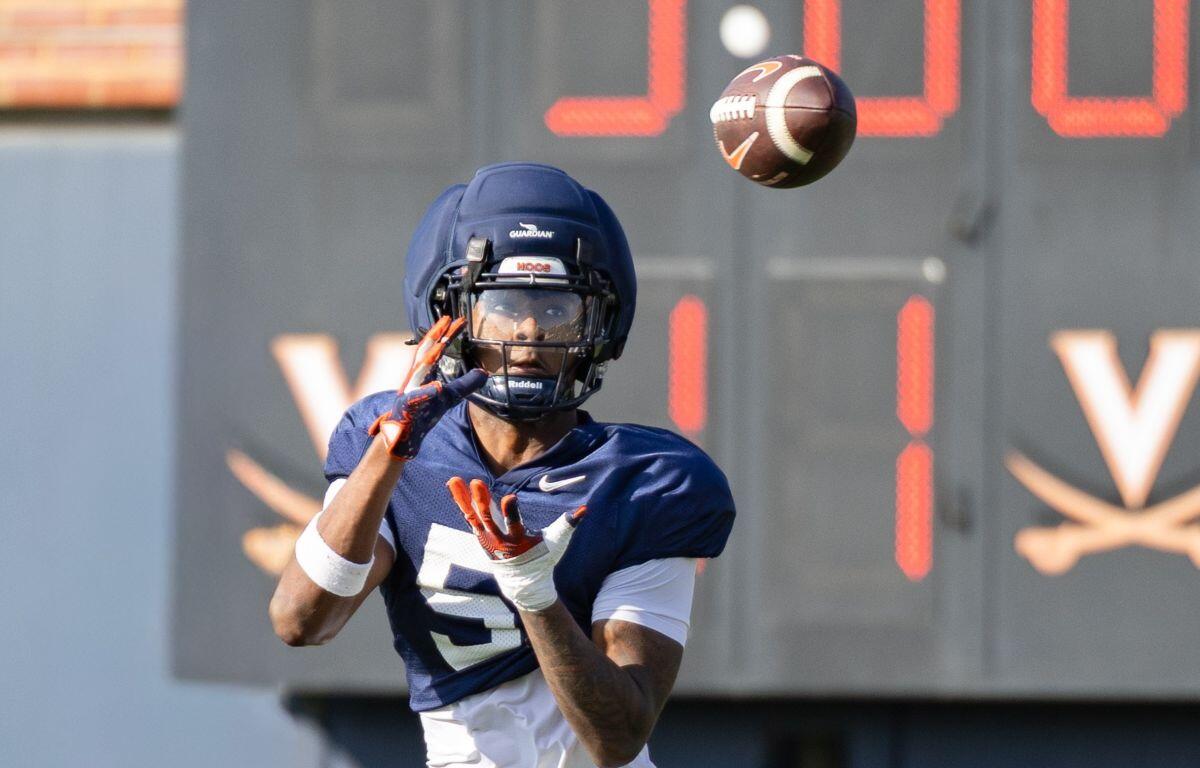 WR Kam Courtney catches a catch during UVA practice