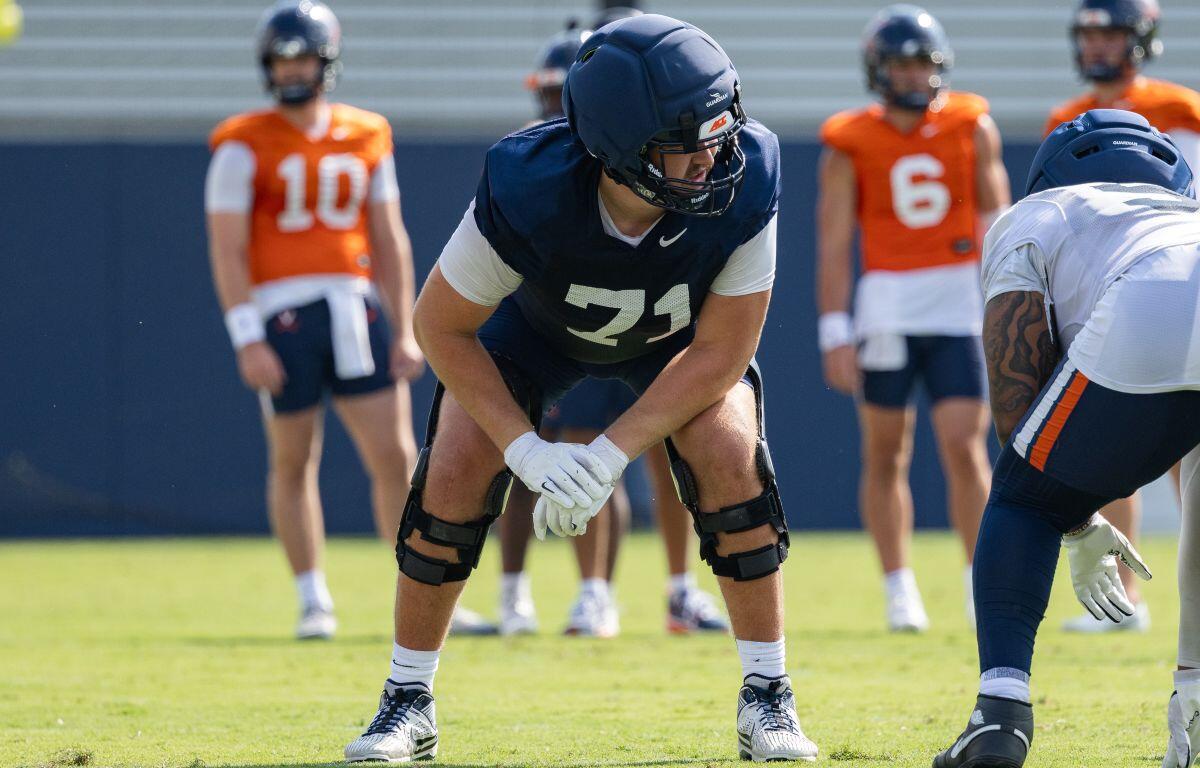 OL Monroe Mills takes a rep during UVA preseason camp.