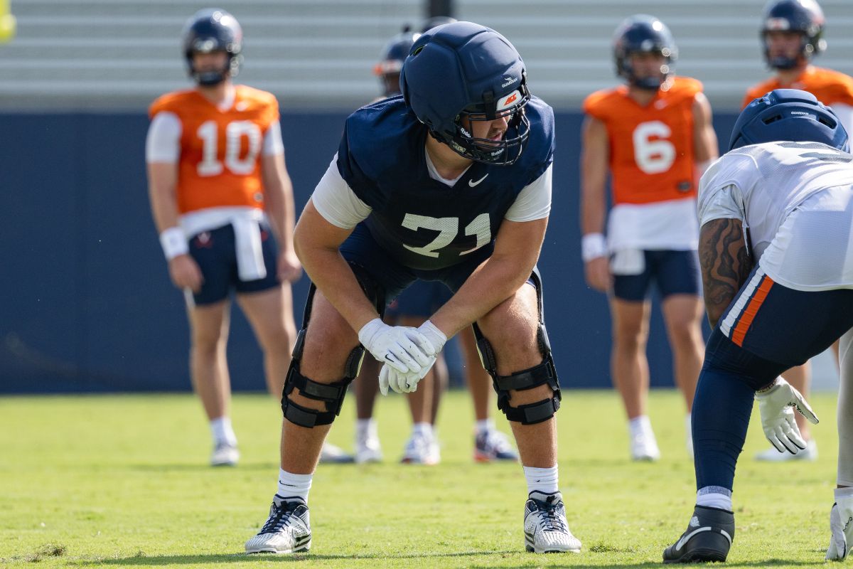 OL Monroe Mills takes a rep during UVA preseason camp.