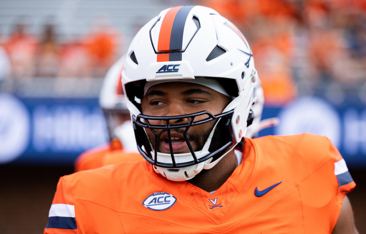 Close up image Virginia Offensive Lineman Makilan Thomas in uniform