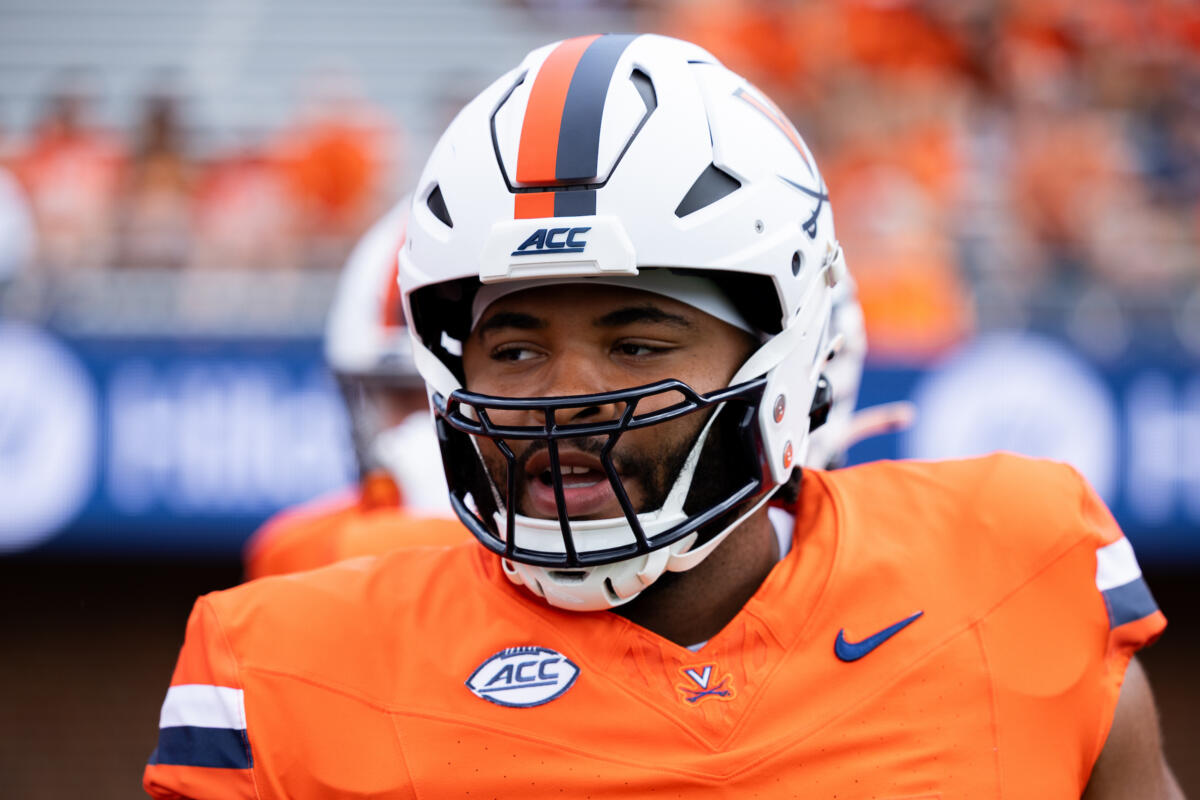 Close up image Virginia Offensive Lineman Makilan Thomas in uniform