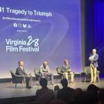 Greg Frith (far left), Tony Elliott (center left) and Will Bettridge (center right) receive a standing ovation after Sunday's screening.