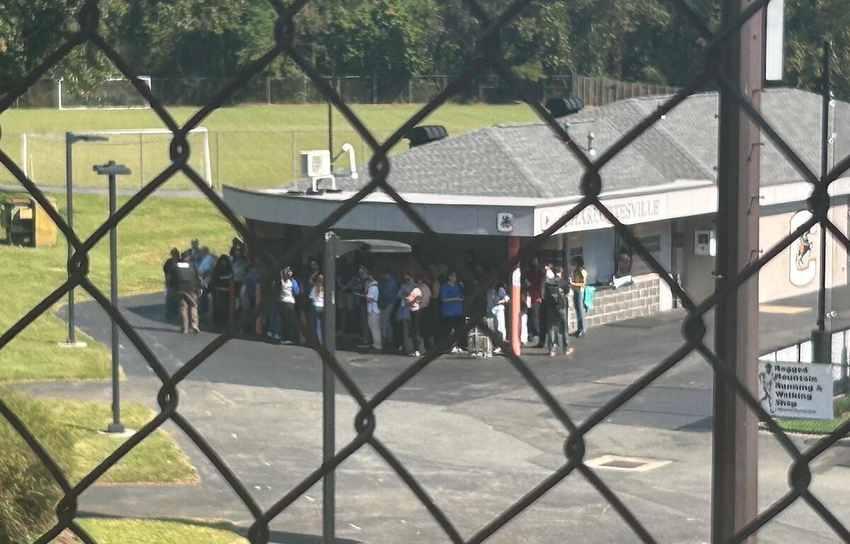 Charlottesville High School teachers evacuated to the nearby football stadium.