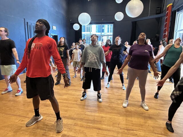 Marlon Proverbs leads Thriller rehearsal