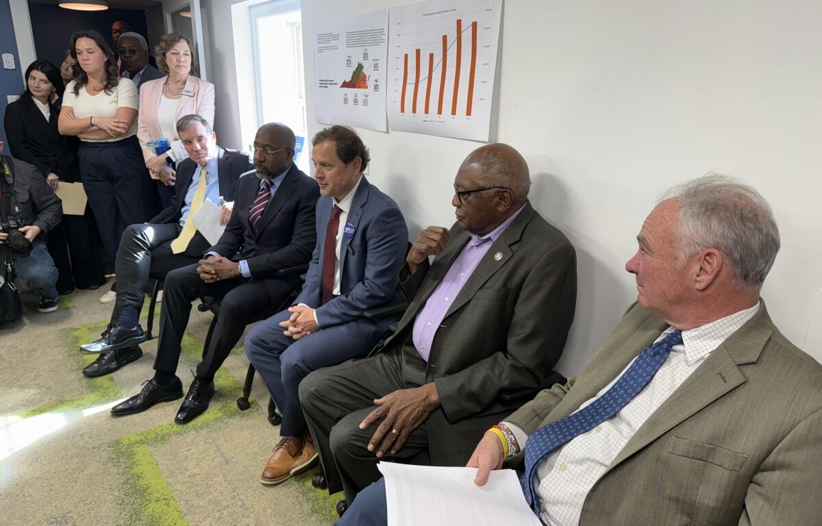 Left to right: Va. Sen. Mark Warner, Ga. Sen. Raphael Warnock, Tom Perriello, SC Rep. James Clyburn, Va. Sen. Tim Kaine